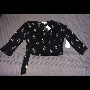 Crop top shirt that ties in the back.